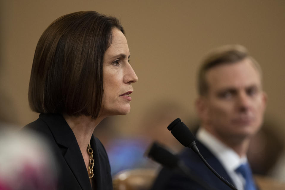 Former White House national security aide Fiona Hill, and David Holmes, a U.S. diplomat in Ukraine, right, testify before the House Intelligence Committee on Capitol Hill in Washington, Thursday, Nov. 21, 2019, during a public impeachment hearing of President Donald Trump's efforts to tie U.S. aid for Ukraine to investigations of his political opponents. (AP Photo/Manuel Balce Ceneta)
