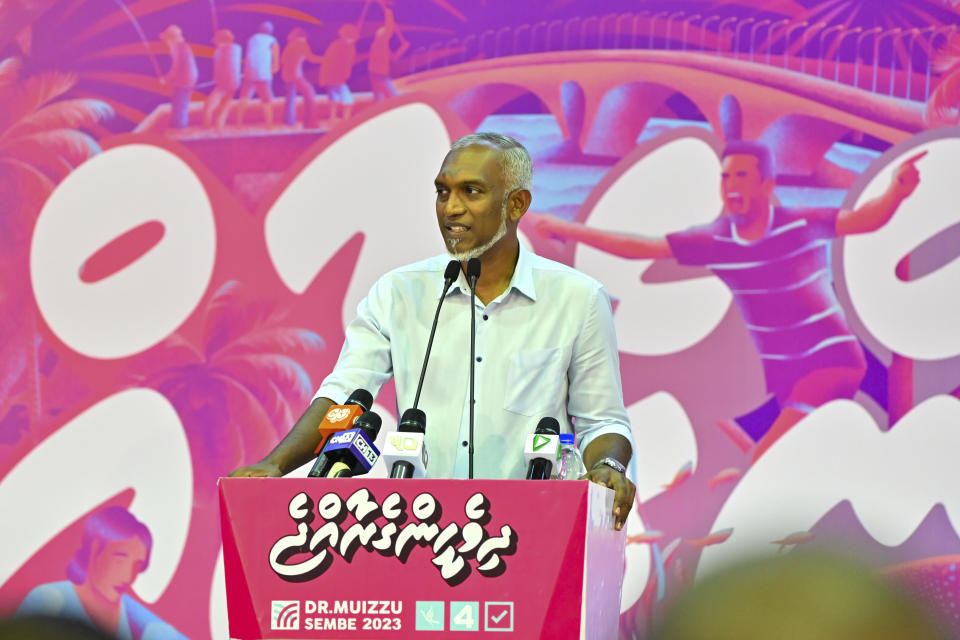 President-elect of the Maldives Mohamed Muiz speaks with supporters in Male, Maldives, Monday, Oct. 2, 2023. Muiz said he will stick to his campaign promise to remove Indian military personnel stationed in the archipelago state, promising he would initiate the process. (AP Photo/Mohamed Sharuhaan)