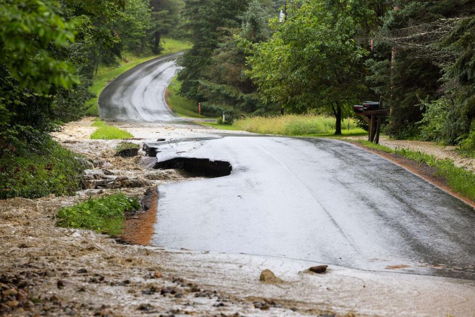 PHOTO: A road is severely damaged by flooding on July 10, 2023 in Windham, Vt. (Scott Eisen/Getty Images)