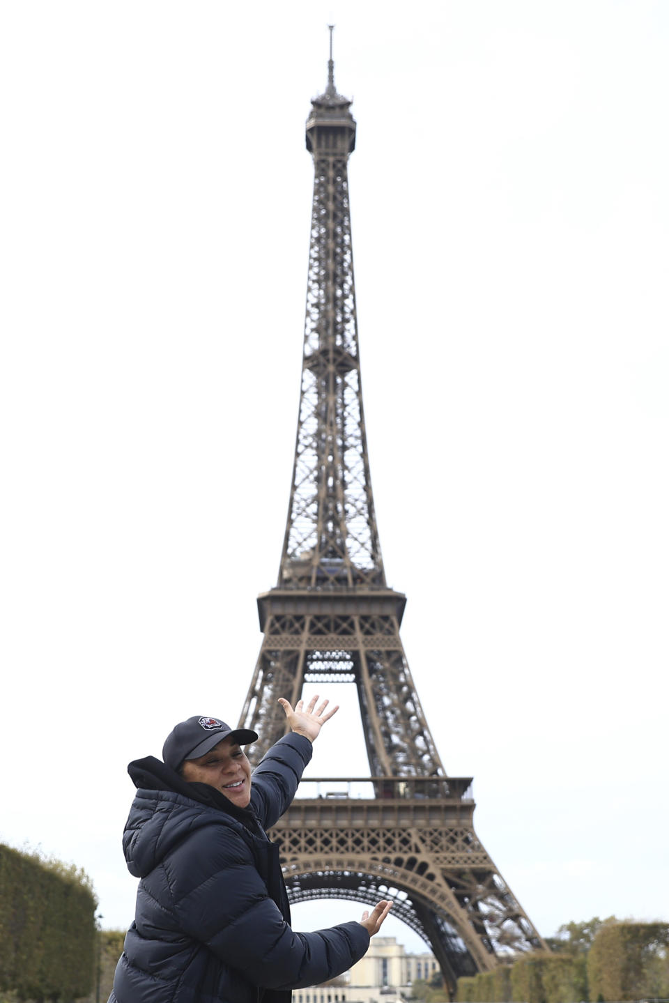 South Carolina college basketball head coach Dawn Staley poses in front of the Eiffel Tower, Thursday Nov. 2, 2023 in Paris. Notre Dame will face South Carolina in a NCAA college basketball game Monday Nov. 6 in Paris. (AP Photo/Aurelien Morissard)