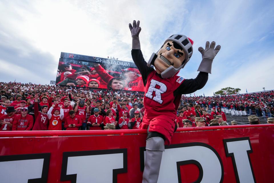 The Rutgers Scarlet Knight celebrates a field goal by kicker Jai Patel.