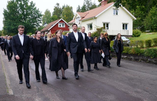 The funeral procession for Sven-Goran Eriksson, including his partner Yaniseth Alcides, heading from Fryksande Church towards his to his homestead in Torsby