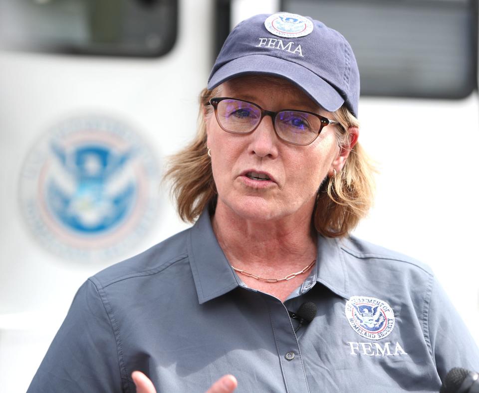 FEMA Administrator Deanne Criswell talks with the media after visiting with survivors of Hurricane Ian's flood and wind damage on Saturday Oct.15, 2022 in North Port.