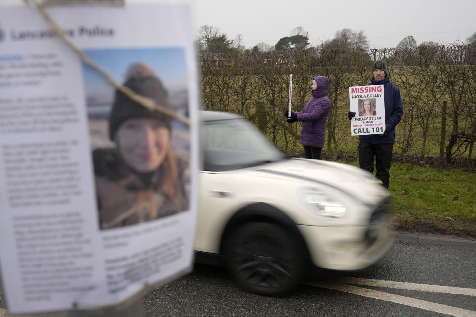 PRESTON, ENGLAND - FEBRUARY 10: People line the streets with placards asking for information on missing Nicola Bulley in the village of St Michael's on Wyre on February 10, 2023 in Preston, England. Police are continuing to look for the missing Inskip woman, Nicola Bulley, 45, and have widened their search towards the Morecambe Bay end of the River Wyre. Nicola hasn't been seen since taking her spaniel for a walk by the River Wyre on the morning of Friday 27th January.  (Photo by Christopher Furlong/Getty Images)