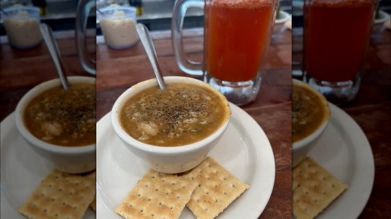 Cup of gumbo with crackers