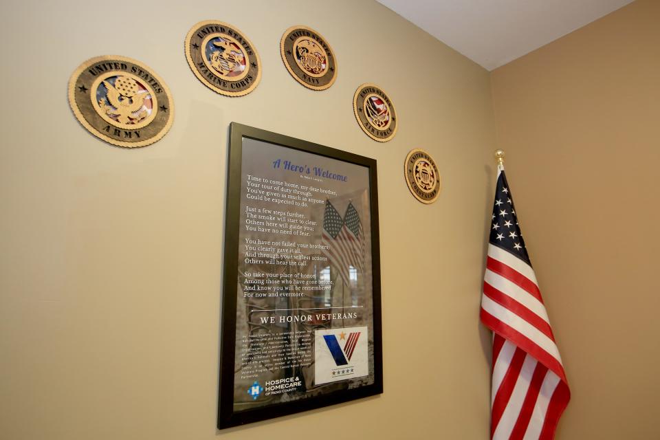 The front foyer of the Hospice House is newly decorated with plaques of the military branches, Kansas and American flags, and a poem called "A Hero's Welcome." The tribute is part of a national program called "We Honor Veterans," that promotes collaboration between hospice organizations and the Department of Veterans Affairs.