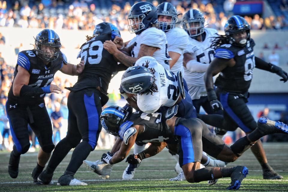 Georgia Southern junior Jalen White makes some tough yards against Georgia State on Saturday at Center Parc Stadium in Atlanta.  White was the Eagles' leading rusher with 71 yards.