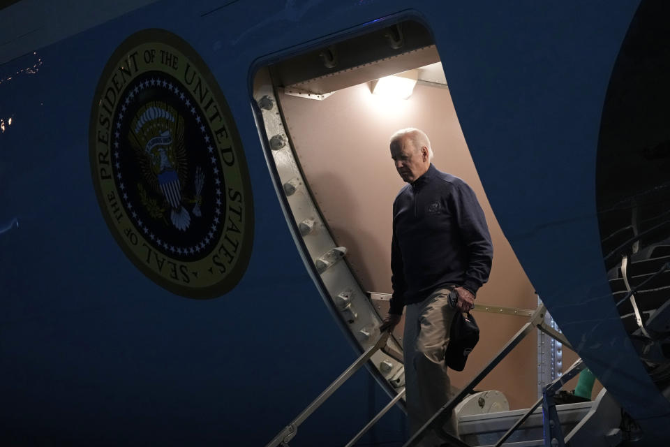 President Joe Biden walks down the steps of Air Force One at Andrews Air Force Base, Md., late Sunday, May 21, 2023, after returning from the G7 Summit in Hiroshima, Japan. Biden returned early from his foreign trip to work on negotiations on the debt limit. (AP Photo/Susan Walsh)