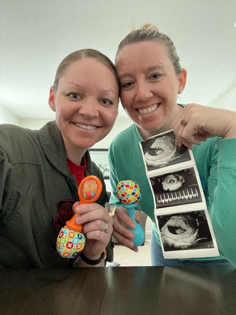 Blakely and Sarah Murdock with their ultrasound photos.