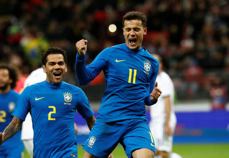 Soccer Football - International Friendly - Russia vs Brazil - Luzhniki Stadium, Moscow, Russia - March 23, 2018 Brazil’s Philippe Coutinho celebrates with Dani Alves after scoring their second goal REUTERS/Sergei Karpukhin