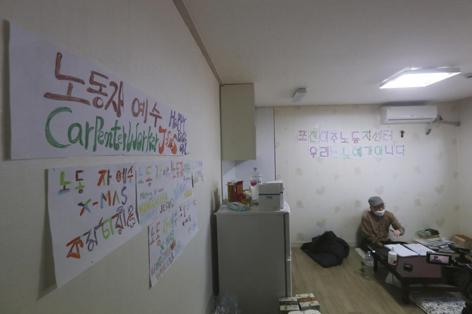 Kim Dal-sung, a pastor who vocally advocates for migrant workers' rights, speaks during an interview at his office in Pocheon, South Korea on Feb. 8, 2021. In the town near South Korea’s capital, hundreds of migrant workers from across Asia toil in silence, isolated and unprotected by labor laws. Activists and workers say migrant workers in Pocheon work 10 to 15 hours a day, with only two Saturdays off per month. They earn around $1,300-1,600 per month, well below the legal minimum wage their contracts are supposed to ensure. (AP Photo/Ahn Young-joon)