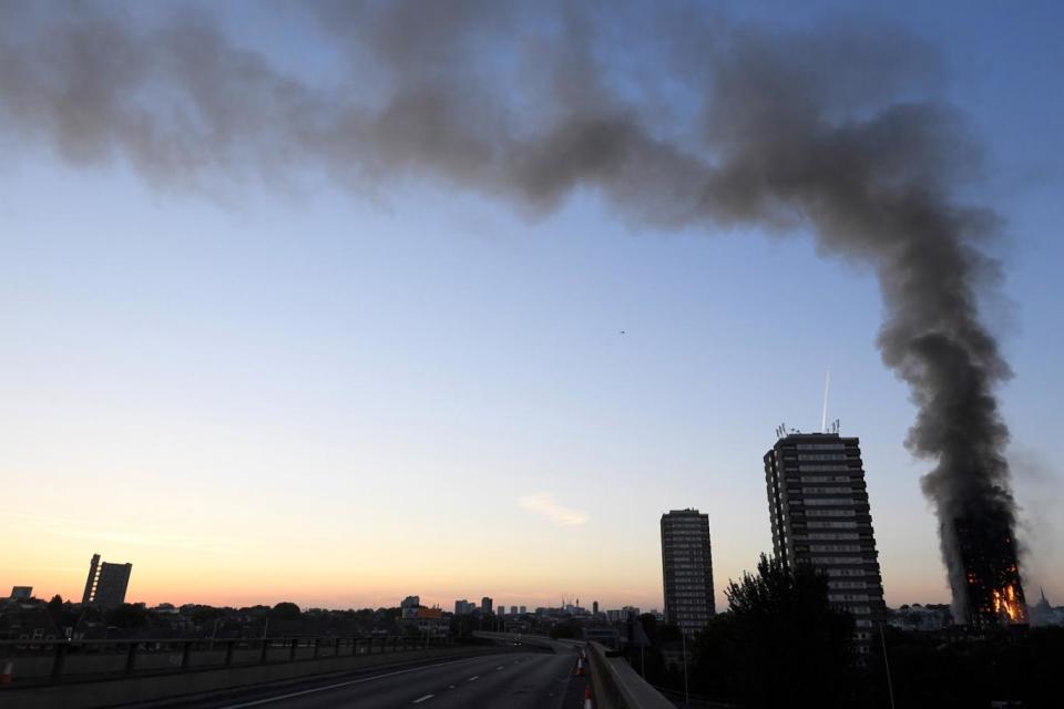 Smoke billows over the Westway during the fire (Reuters)