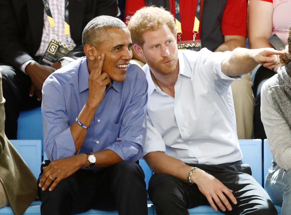 Obama portando el Rolex al lado del príncipe Harry. REUTERS/Mark Blinch