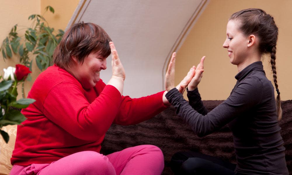 Two women doing rhythm exercises