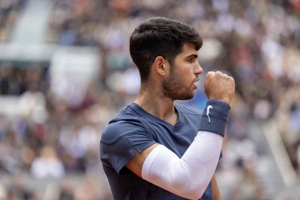 PARIS, FRANCE - June 02:   Carlos Alcaraz of Spain reacts during his match against Felix Auger-Aliassime of Canada on Court Philippe-Chatrier during the fourth round of the 2024 French Open Tennis Tournament at Roland Garros on June 2nd, 2024, in Paris, France. (Photo by Tim Clayton/Corbis via Getty Images)