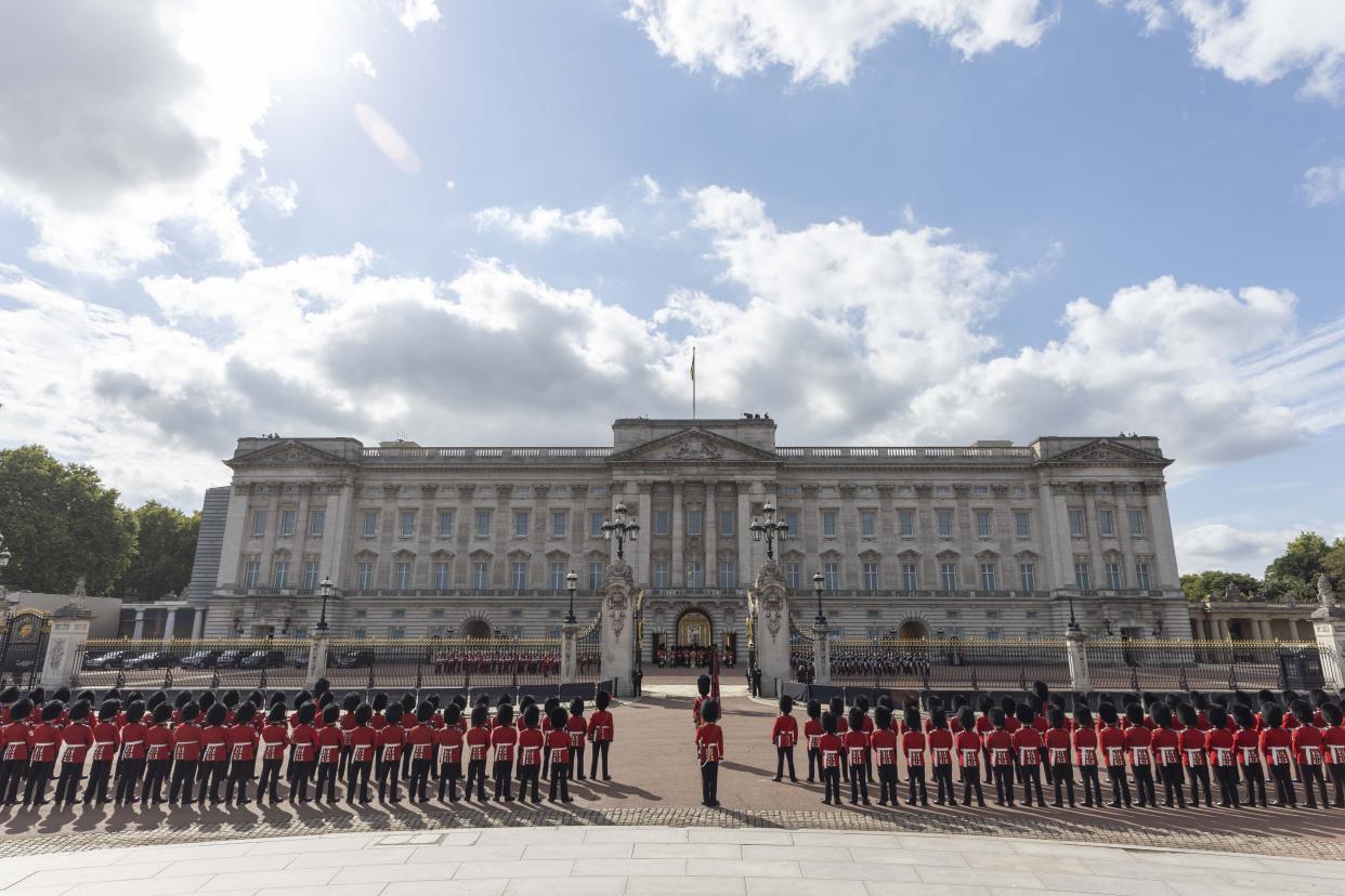 LONDON, UNITED KINGDOM - SEPTEMBER 14: The coffin of Queen Elizabeth II, adorned with a Royal Standard and the Imperial State Crown is pulled by a Gun Carriage of The King's Troop Royal Horse Artillery, during a procession from Buckingham Palace to the Westminster Hall, in London, United Kingdom on September 14, 2022. From Wednesday until a few hours before her funeral on Monday, Queen Elizabeth II will lay in state in Westminster Hall inside the Palace of Westminster, and it is expected that long lines of people will form to pay their respects. (Photo by Rasid Necati Aslim/Anadolu Agency via Getty Images)