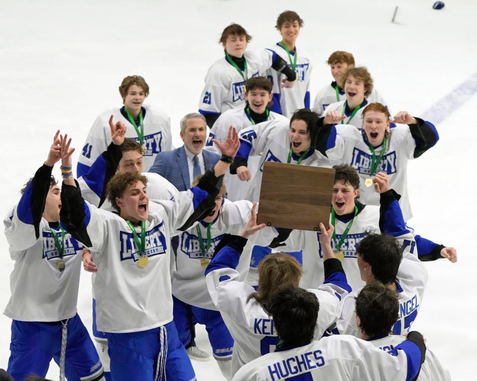 Olentangy Liberty celebrates its 10-1 win over Upper Arlington in Saturday's district final.