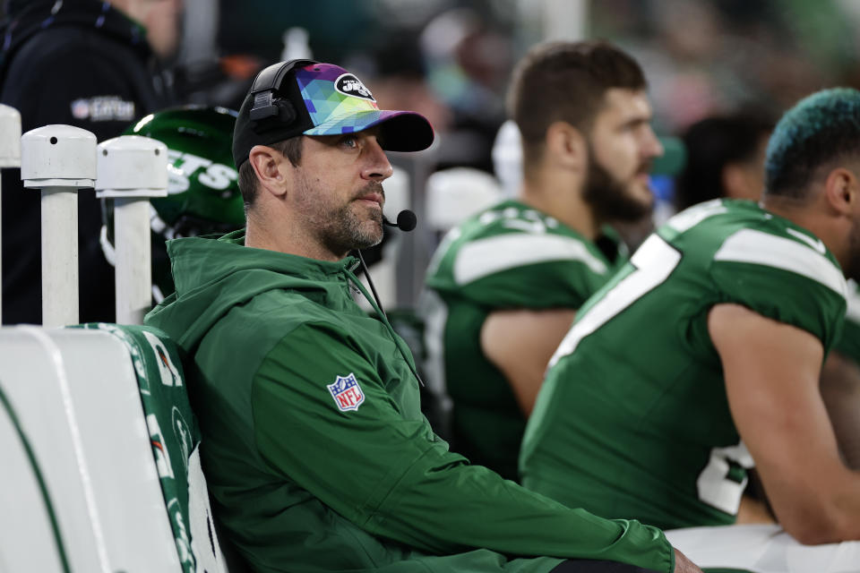 New York Jets quarterback Aaron Rodgers sits on the bench during the second half of an NFL football game against the Philadelphia Eagles, Sunday, Oct. 15, 2023, in East Rutherford, N.J. (AP Photo/Adam Hunger)