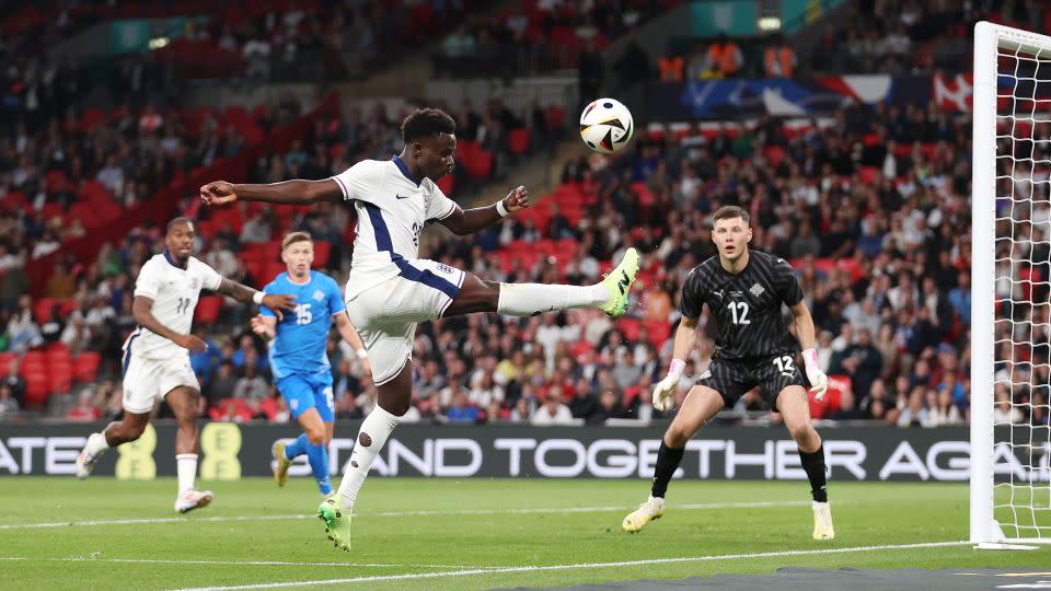 Bukayo Saka of England attempts to keep the ball in play during the international friendly match between England and Iceland at Wembley Stadium on June 07, 2024 in London, England. - Julian Finney/Getty Images