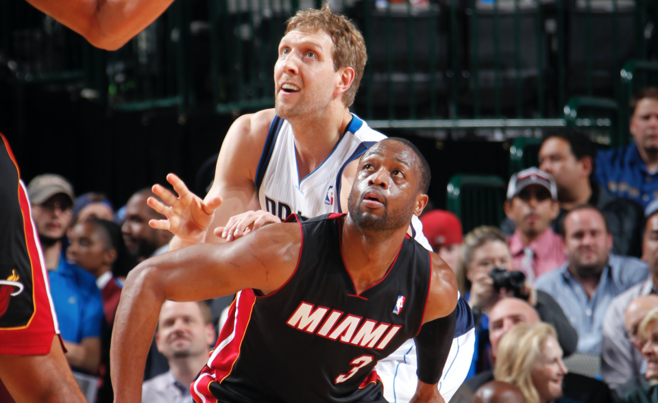 Dwyane Wade and Dirk Nowitzki battled in the 2011 NBA Finals, and now they will likely play in their final All-Star Game later this month. (Photo by Glenn James/NBAE via Getty Images)