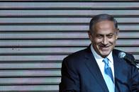 FILE PHOTO: Israeli Prime Minister Benjamin Netanyahu delivers a speech to supporters at party headquarters in Tel Aviv