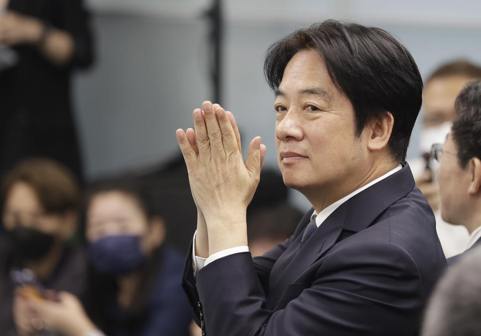 Taiwan's Vice President Lai Ching-te, also known as William Lai, cheers during a press conference in Taipei, Taiwan, Wednesday, April 12, 2023. Taiwan’s pro-independence ruling Democratic Progressive Party nominated Lai as its candidate in the 2024 presidential election, two days after China concluded large-scale wargames around the self-governed island. (AP Photo/Chiang Ying-ying)