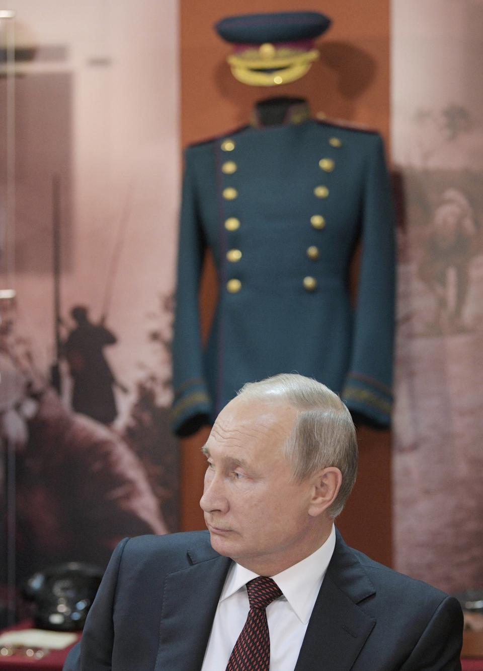 Russian President Vladimir Putin attends a meeting with WWII veterans activists the Kursk Battle memorial museum in Kursk, 426 kilometers (266 miles) south of Moscow, Russia, Thursday, Aug. 23, 2018. Putin attends a ceremony marking the 75th anniversary of the battle of Kursk in which the Soviet army routed Nazi troops. It is described by historians as the largest tank battle in history involving thousands of tanks.(Alexei Druzhinin, Sputnik, Kremlin Pool Photo via AP)