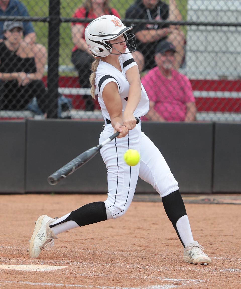 Delaney Shannon of Hoover connects for a triple in the fourth inning against Walsh Jesuit in a Division I regional semifinal at Youngstown State, Tuesday, May 24, 2022.