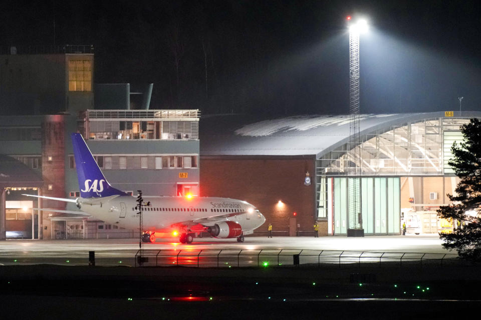 The MEDEVAC plane with Norway's King Harald on board arrives at Oslo Airport Gardermoen, in Gardermoen, Norway, Sunday, March 3, 2024. The aircraft belonging to SAS, tail number LN-RPJ, was requisitioned by the Norwegian Armed Forces and used to bring the king home after he fell ill and was hospitalized in Langkawi, Malaysia. (Javad Parsa/NTB Scanpix via AP)