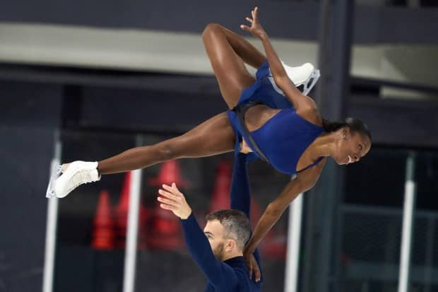 Vanessa James, top, and Eric Radford, bottom, of Canada skated to a score of 115.72 in the free skating pairs event at the Skate Canada Autumn Classic International on Friday. (Geoff Robins/AFP via Getty Images - image credit)