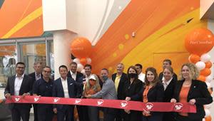 Jack Barrett, President & CEO of First Citrus Bank along with Chris Steinocher, President & CEO of St Pete Chamber and other First Citrus Bank associates and board members cutting ribbon for new First Citrus Bank St Pete location.