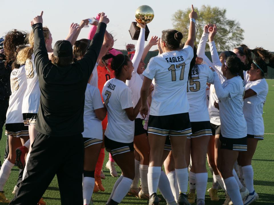 The Abilene High girls soccer team celebrates beating Amarillo High 3-2 in a Region I-5A quarterfinal playoff game on Friday at Lubbock-Cooper High School.