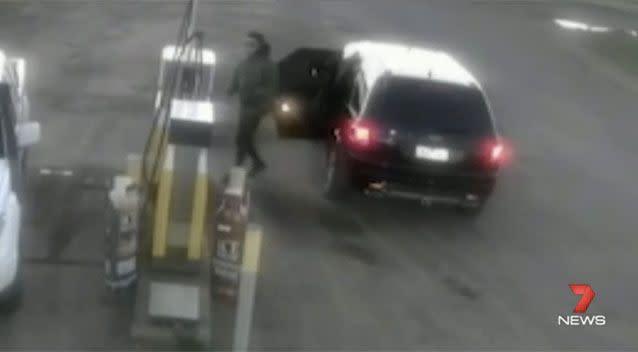 One of the men caught on CCTV stealing petrol. Source: 7News