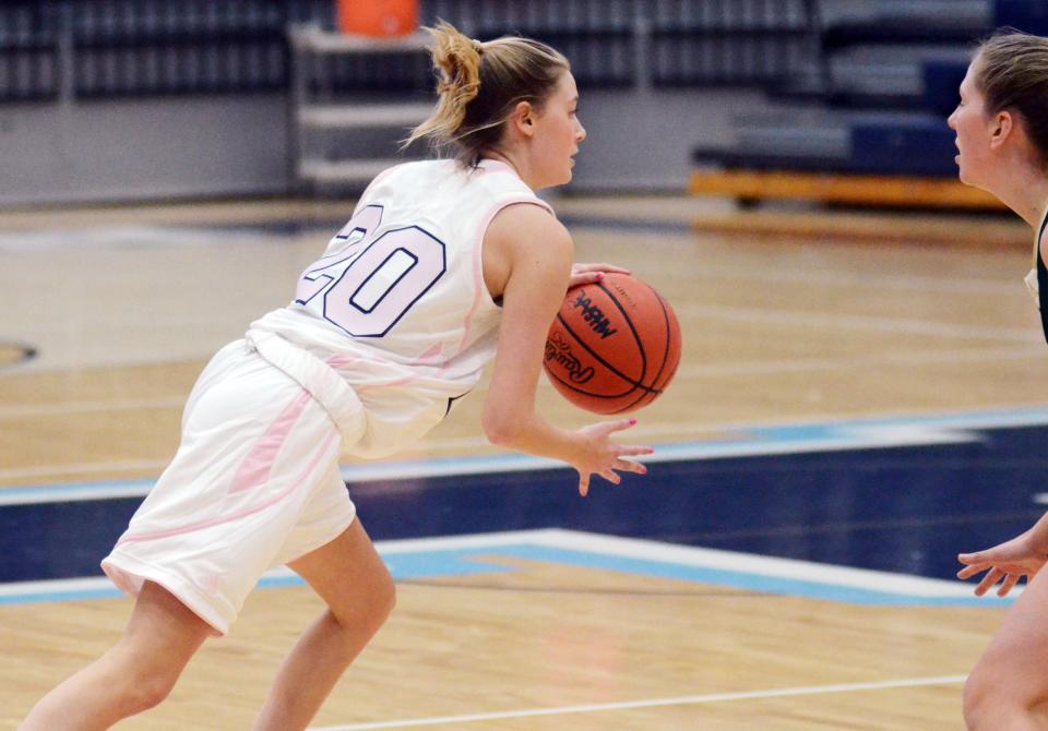 Petoskey's Eva Guy drives on her defender during the first half of Friday's game vs. TC West.