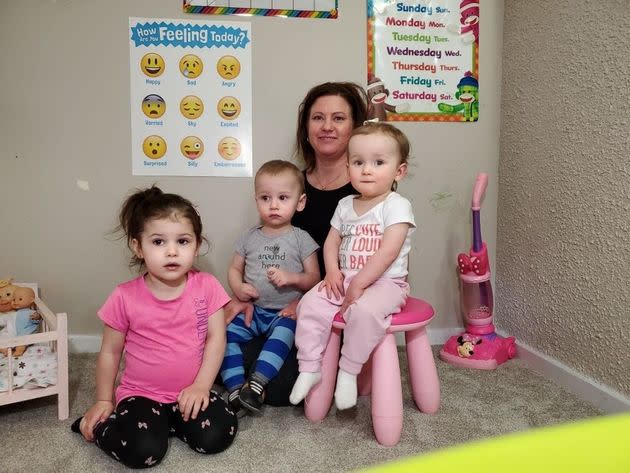 Edmonton day home provider Kim Troy is shown in a photo with some children she cares for. (The parents of the children consented to this photo being shared with HuffPost Canada).