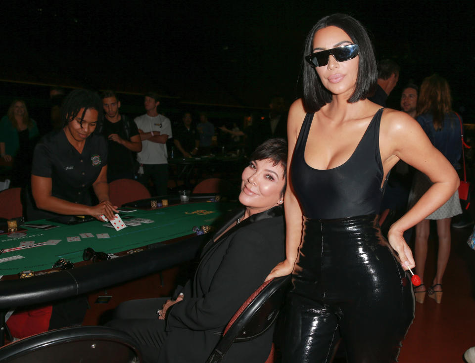 Kim Kardashian showed off her trim figure at the If Only charity poker tournament Sunday. (Photo: Rich Fury/Getty Images)