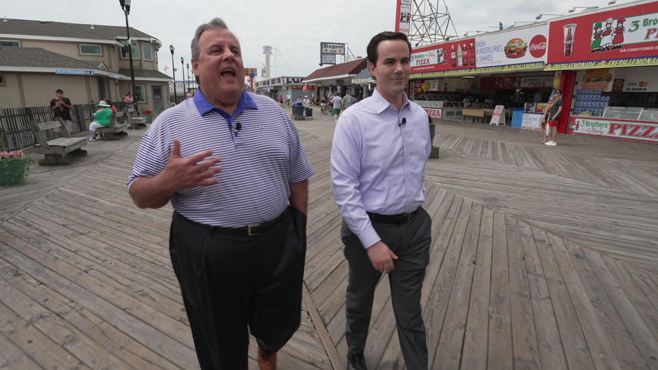 Former Gov. Chris Christie, with CBS News' Robert Costa, on the boardwalk in Seaside Heights, N.J.  / Credit: CBS News