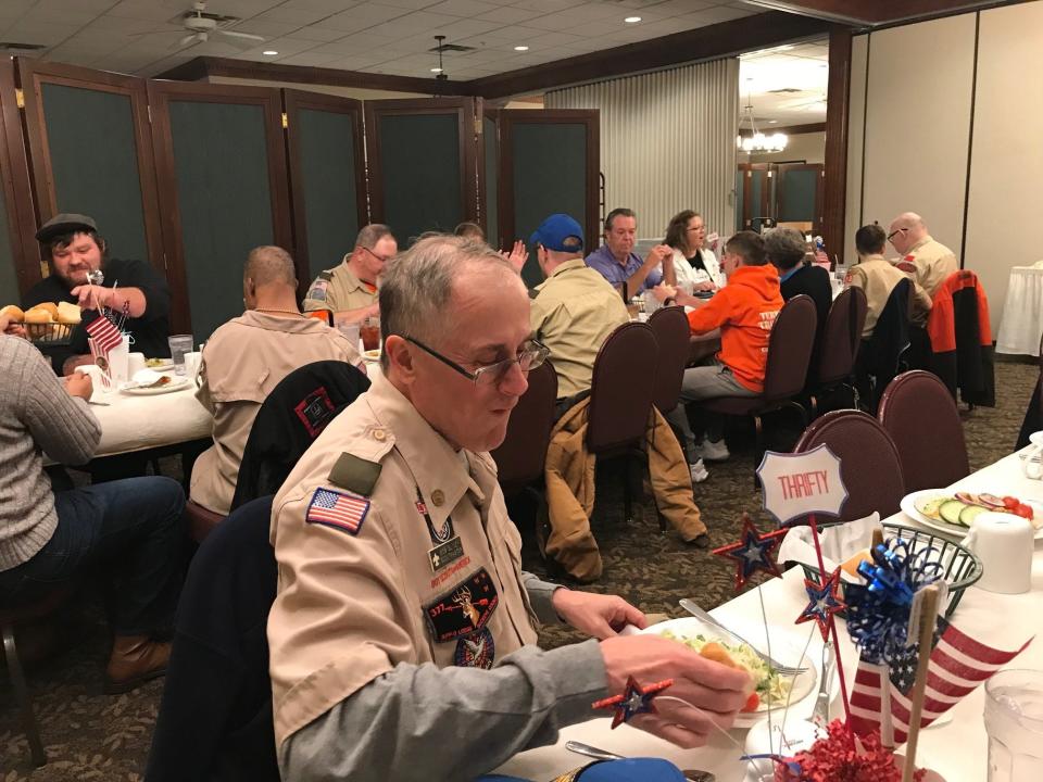 Boy Scout Troop 123 Scoutmaster Bob Sliney founded the troop for individuals with special needs 40 years ago. Tuesday, everyone celebrated the anniversary at Der Dutchman.