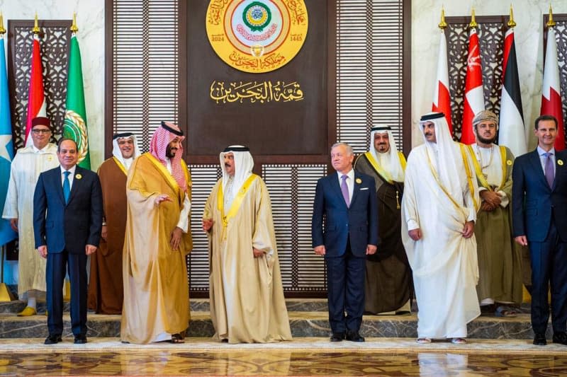 Leaders pose for a family photo as they attend the 33rd Arab League Summit. -/Saudi Press Agency/dpa