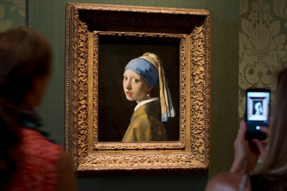 Johannes Vermeer’s Girl with a Pearl Earring is a 1665 masterpiece which has inspired a bestselling novel and a Hollywood film (AP)