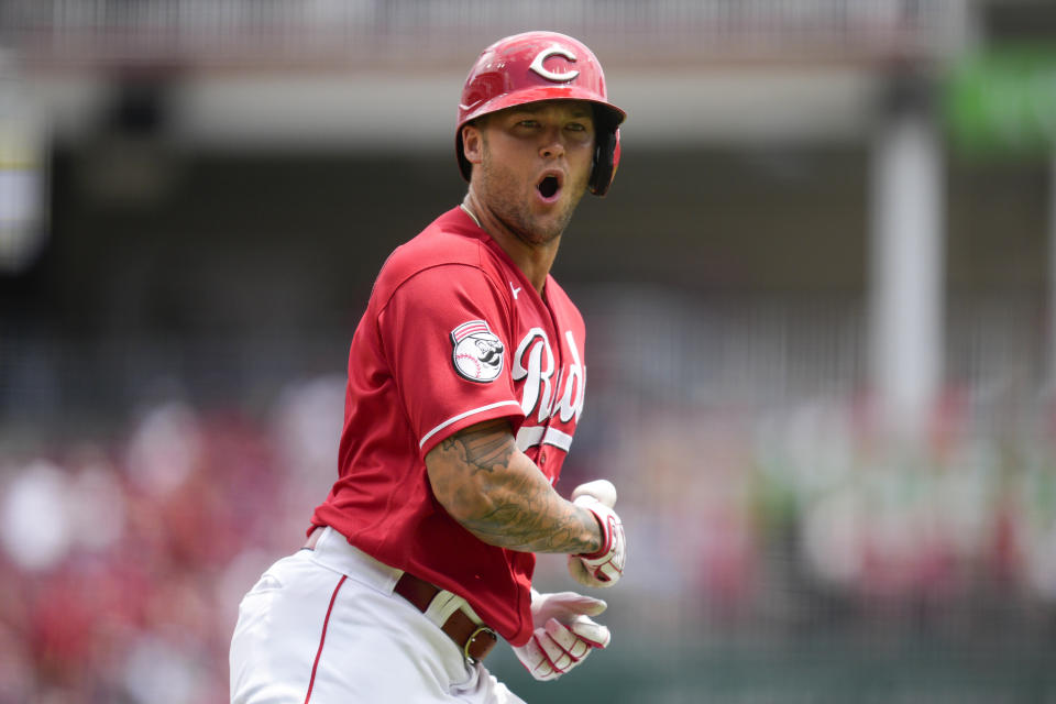 Cincinnati Reds' Nick Senzel reacts after hitting a two-run home run against the Arizona Diamondbacks during the second inning of a baseball game Sunday, July 23, 2023, in Cincinnati. (AP Photo/Jeff Dean)