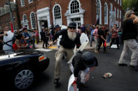 <p><span>Members of white nationalists clash a group of counter-protesters in Charlottesville, Virginia, U.S., August 12, 2017. (Photo: Joshua Roberts/Reuters)</span> </p>