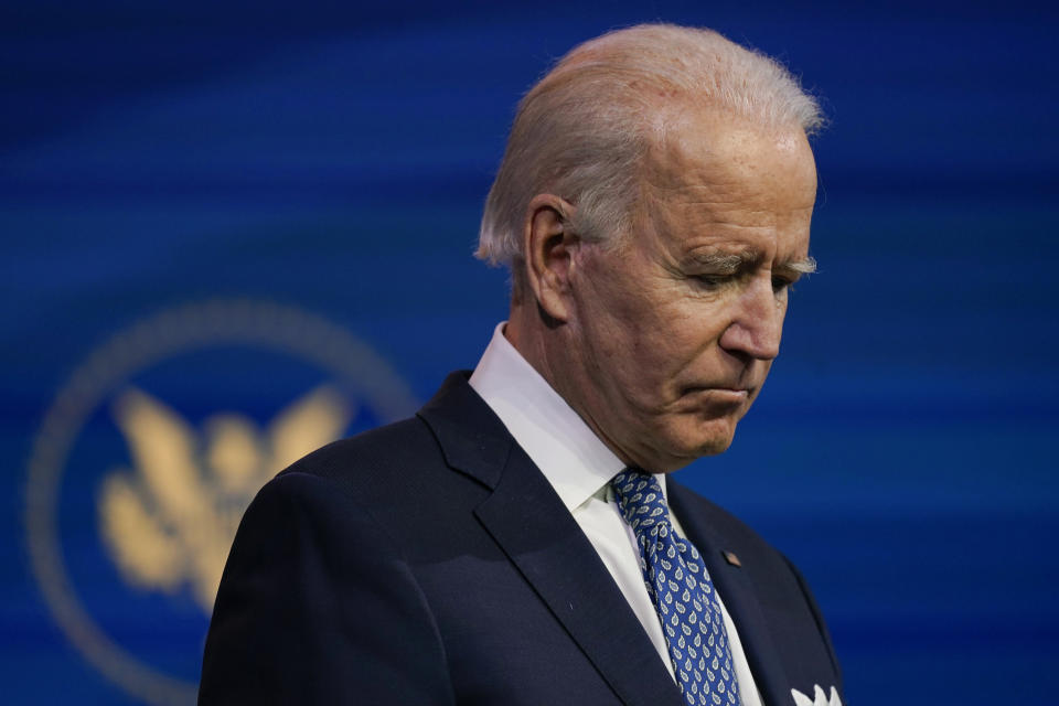 President-elect Joe Biden pauses as he speaks at The Queen Theater in Wilmington, Del., Tuesday, Dec 22, 2020. (AP Photo/Carolyn Kaster)