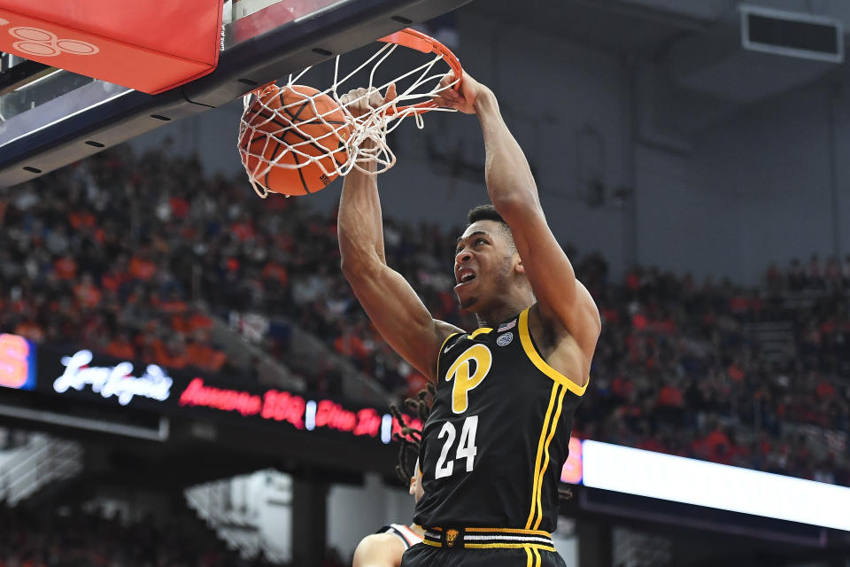 Pittsburgh forward William Jeffress (24) dunks during the first half of an NCAA college basketball game against Syracuse in Syracuse, N.Y., Saturday, Dec. 30, 2023. (AP Photo/Adrian Kraus)