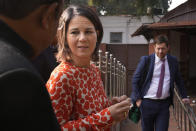 German Foreign Minister Annalena Baerbock, talks to an official during her visit to the Gandhi Smriti, a place where Mahatma Gandhi spent the last days of his life and was assassinated, in New Delhi, Monday, Dec. 5, 2022. Baerbock is on a two days official visit to India. (AP Photo/Manish Swarup)