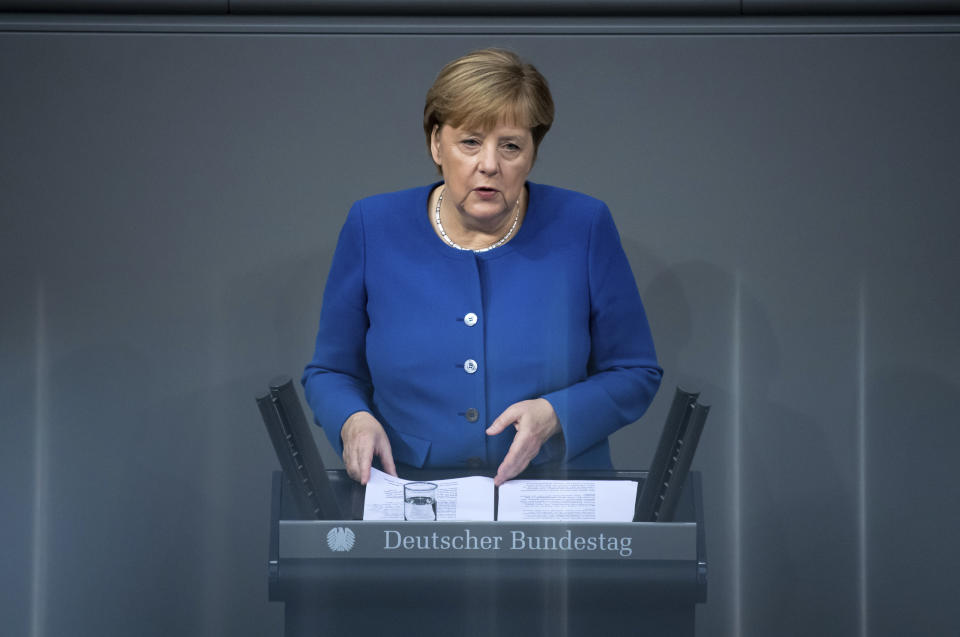 German Chancellor Angela Merkel speaks at the German parliament Bundestag in Berlin, Germany, Thursday, Oct.17, 2019. (Bernd von Jutrczenka/dpa via AP)