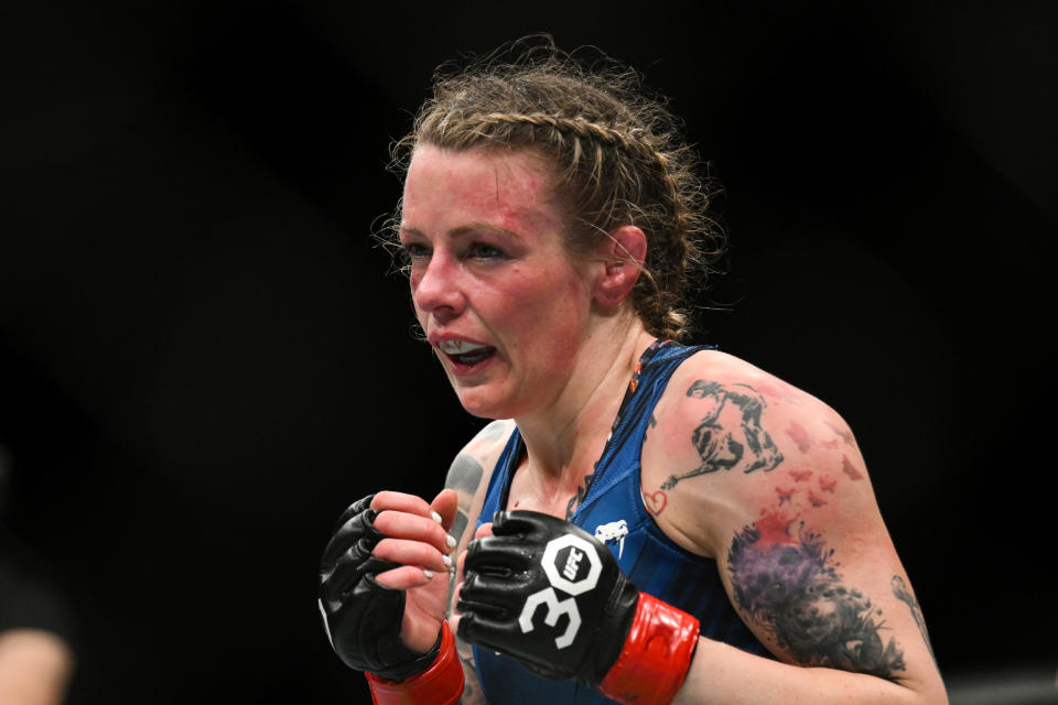 Mar 18, 2023; London, UNITED KINGDOM; Joanne Wood (red gloves) fights Luana Carolina (not pictured) during UFC 286 at O2 Arena. Mandatory Credit: Per Haljestam-USA TODAY Sports