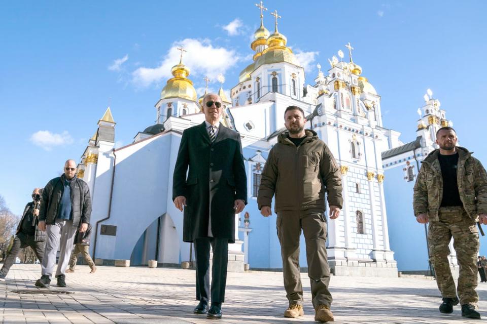 President Joe Biden walks with Ukrainian President Volodymyr Zelenskyy at St. Michael's Golden-Domed Cathedral on a surprise visit, Monday, Feb. 20, 2023, in Kyiv.