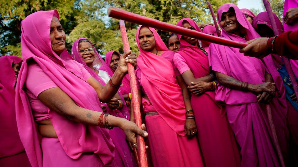 Women's rights activist group the Gulabi gang, or "the pink gang", photographed in Uttar Pradesh, India, in 2011. - Jonas Gratzer/LightRocket/Getty Images