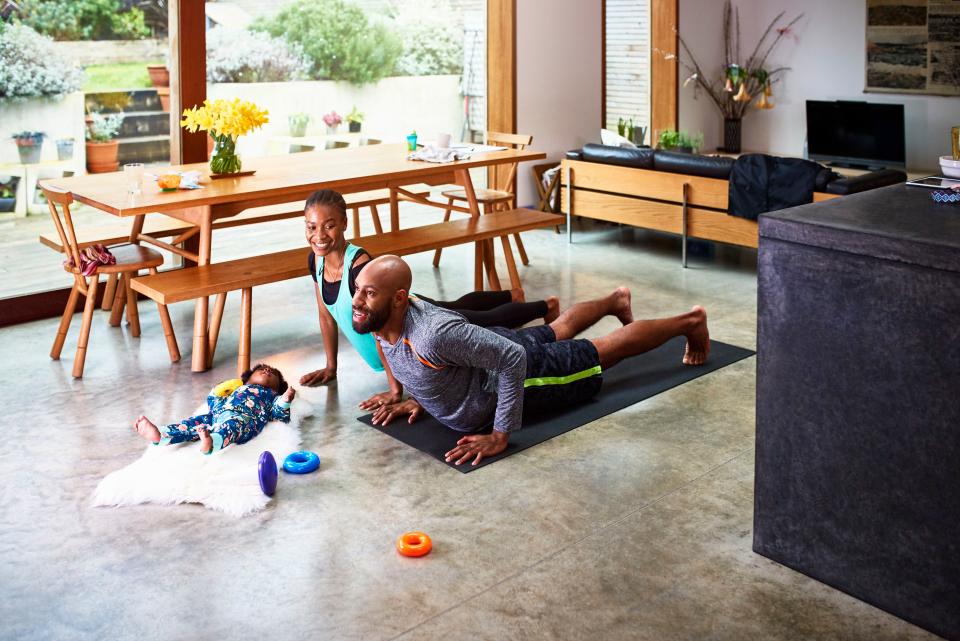 <h1 class="title">Baby boy with parents practicing yoga</h1><cite class="credit">Photo: Via Getty Images</cite>